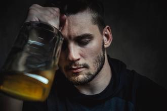 
		A man with an alcohol addiction is depressed
	